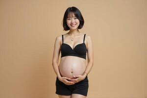 photo of pregnant woman standing pose with beige background,