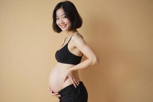 photo of pregnant woman standing pose with beige background,
