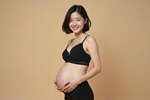 photo of pregnant woman standing pose with beige background,
