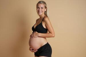 photo of pregnant woman standing pose with beige background,