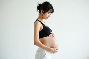 photo of pregnant woman standing pose on white background,