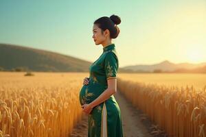 photo of pregnant woman standing pose on golden wheat field,