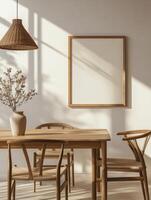 Frame Mockup Above Wooden Dining Table with Matching Chairs and Pendant Light photo