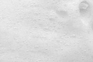 Abstract white soap foam bubbles texture background photo