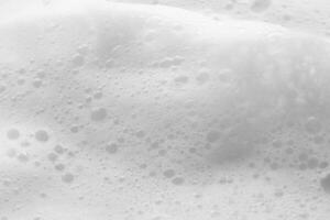 Abstract white soap foam bubbles texture background photo