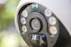 Security IP CCTV camera using solar energy install on the tree for home security system photo