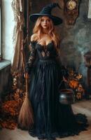 A stunning woman dressed as a witch holding a broom, standing beside a bubbling cauldron photo