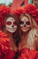 A cheerleader and her friend displaying red and white pompoms, wearing Halloween costumes with skull makeup photo