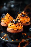 Halloween themed cupcakes with spider decorations are creatively arranged on a festive plate for display photo