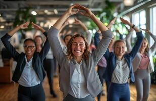Office workers from different backgrounds engaged in group stretching exercises during a break photo