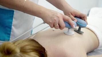 Using electromagnetic super inductive system to recover from shoulder injuries. Going to SIS therapies for muscle relaxation. Recovery from trauma and rheumatic pathologies in a physiotherapy clinic. video