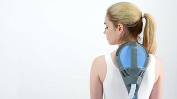 A doctor performs a magnetic therapy session using a super inductive system to treat back pain without surgery. Enhances tissue condition and speeds up recovery video