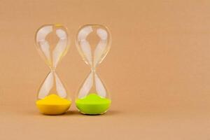 Hourglass photo in studio concept of time and the rules of precious and limited time.