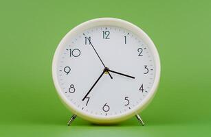 Alarm clock stops time photography in studio Time concept and working with time photo
