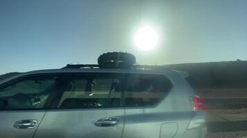 View of desert steppe from car window in Zagora Morocco video