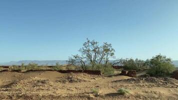 View of desert steppe from car window in Zagora Morocco video