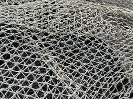 black fishing net background texture photo