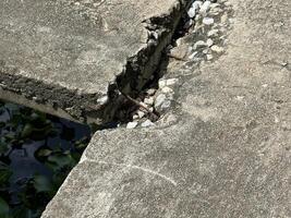 concrete floor with broken hole photo