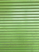 old green metal fence background photo