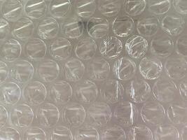 Air Bubble wrap texture background. Plastic packaging material. photo