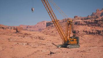 A large crane in the middle of a desert video