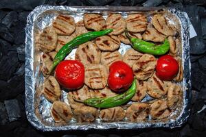 Grilled Meatballs With Peppers and Tomatoes photo