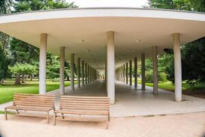 Podebrady- Czech- 27 July 2024. Mineral water source in famous kolonada in park photo