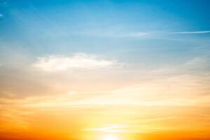Beautiful , luxury soft gradient orange gold clouds and sunlight on the blue sky perfect for the background, take in everning,Twilight, Large size, high definition landscape photo