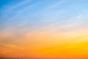 Beautiful , luxury soft gradient orange gold clouds and sunlight on the blue sky perfect for the background, take in everning,Twilight, Large size, high definition landscape photo