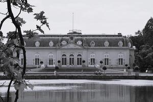 It's a black and white picture of a castle, Benrath palace near Germany photo