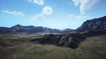 An aerial view of a mountain range in the mountains video