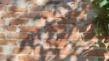 Brown old brick wall with shadow from leaves and rays of light, texture background for product presentation, architecture and modern design photo