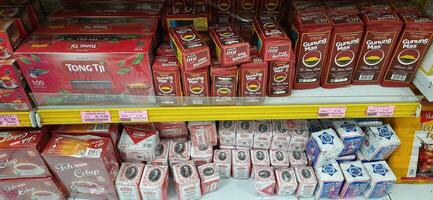 Coang supermarket shelf display. One of the complete cake and food equipment and ingredients stores in Makassar. South Sulawesi, Indonesia - August 7 2024 photo