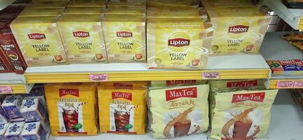 Coang supermarket shelf display. One of the complete cake and food equipment and ingredients stores in Makassar. South Sulawesi, Indonesia - August 7 2024 photo
