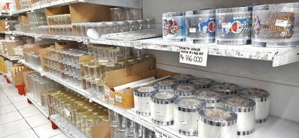 Coang supermarket shelf display. One of the complete cake and food equipment and ingredients stores in Makassar. South Sulawesi, Indonesia - August 7 2024 photo
