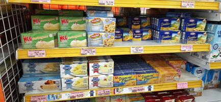 Coang supermarket shelf display. One of the complete cake and food equipment and ingredients stores in Makassar. South Sulawesi, Indonesia - August 7 2024 photo