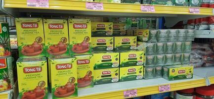 Coang supermarket shelf display. One of the complete cake and food equipment and ingredients stores in Makassar. South Sulawesi, Indonesia - August 7 2024 photo