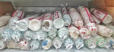 Coang supermarket shelf display. One of the complete cake and food equipment and ingredients stores in Makassar. South Sulawesi, Indonesia - August 7 2024 photo