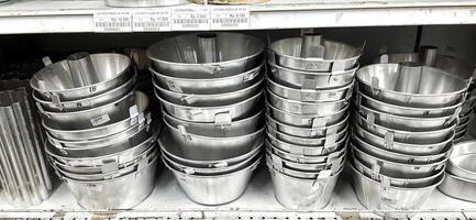 Coang supermarket shelf display. One of the complete cake and food equipment and ingredients stores in Makassar. South Sulawesi, Indonesia - August 7 2024 photo