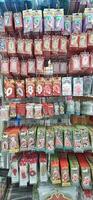Coang supermarket shelf display. One of the complete cake and food equipment and ingredients stores in Makassar. South Sulawesi, Indonesia - August 7 2024 photo