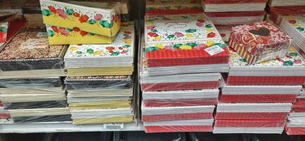 Coang supermarket shelf display. One of the complete cake and food equipment and ingredients stores in Makassar. South Sulawesi, Indonesia - August 7 2024 photo
