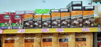 Coang supermarket shelf display. One of the complete cake and food equipment and ingredients stores in Makassar. South Sulawesi, Indonesia - August 7 2024 photo