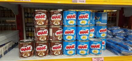 Coang supermarket shelf display. One of the complete cake and food equipment and ingredients stores in Makassar. South Sulawesi, Indonesia - August 7 2024 photo