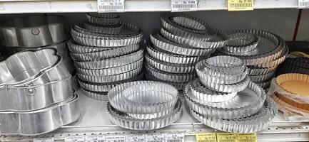 Coang supermarket shelf display. One of the complete cake and food equipment and ingredients stores in Makassar. South Sulawesi, Indonesia - August 7 2024 photo