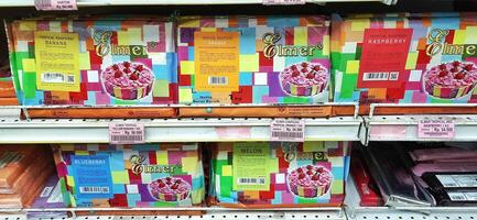 Coang supermarket shelf display. One of the complete cake and food equipment and ingredients stores in Makassar. South Sulawesi, Indonesia - August 7 2024 photo