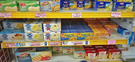 Coang supermarket shelf display. One of the complete cake and food equipment and ingredients stores in Makassar. South Sulawesi, Indonesia - August 7 2024 photo