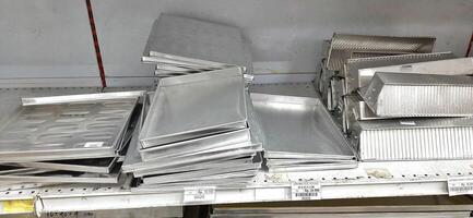 Coang supermarket shelf display. One of the complete cake and food equipment and ingredients stores in Makassar. South Sulawesi, Indonesia - August 7 2024 photo
