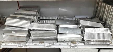 Coang supermarket shelf display. One of the complete cake and food equipment and ingredients stores in Makassar. South Sulawesi, Indonesia - August 7 2024 photo