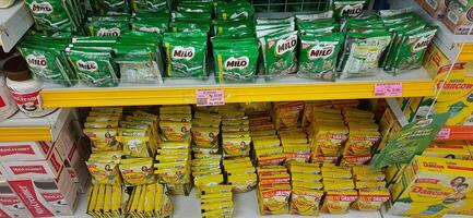 Coang supermarket shelf display. One of the complete cake and food equipment and ingredients stores in Makassar. South Sulawesi, Indonesia - August 7 2024 photo