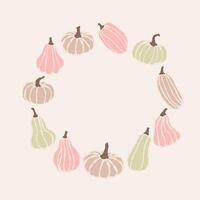 A circular arrangement of gently colored pumpkins in various shapes against a soft background vector
